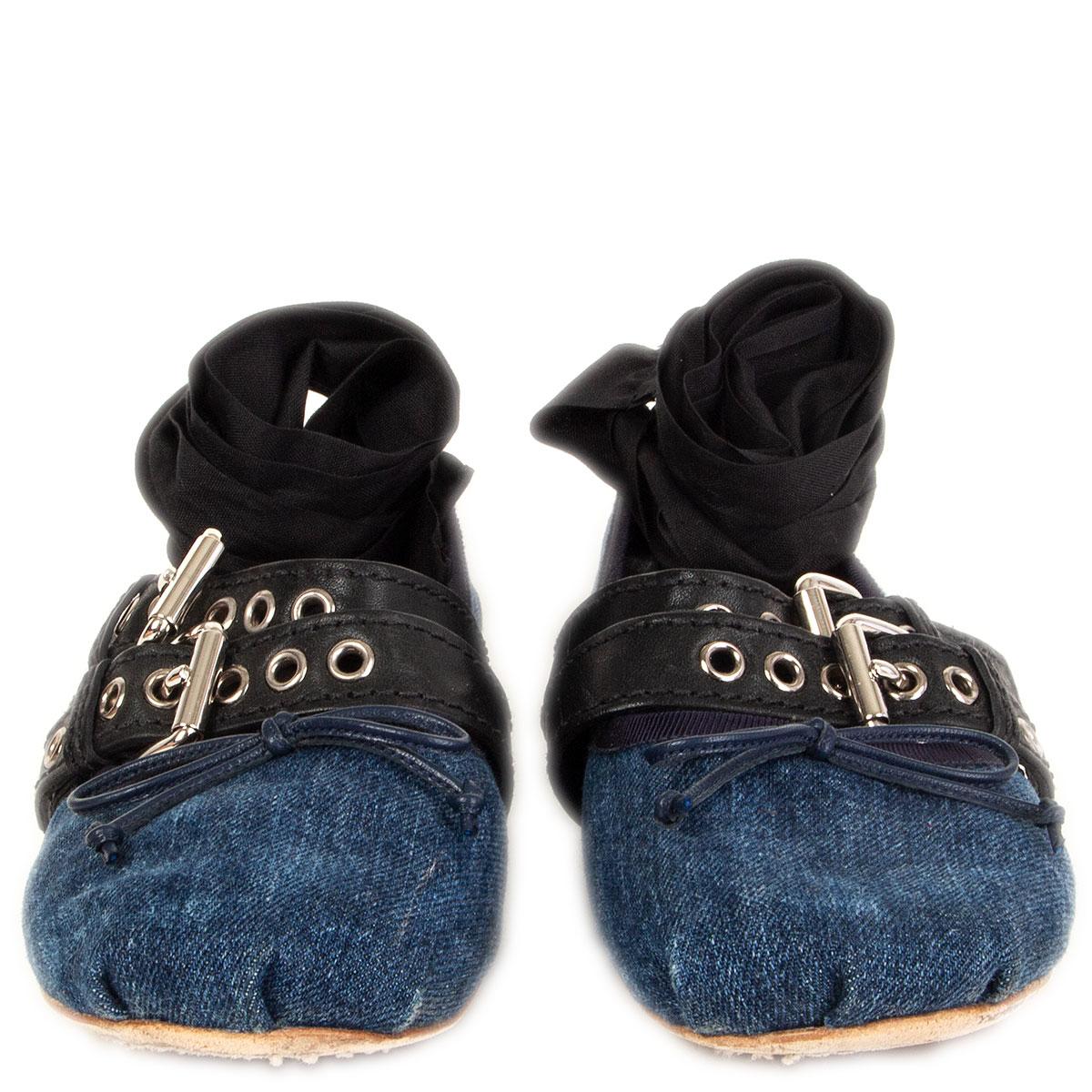100% authentic Miu Miu ballet flats in indigo blue denim featuring black calfskin buckle closure with silver-tone hardware. Grograin trim and leather bow detail. Come with detachable ribbon belts in black canvas. Have been worn and are in excellent