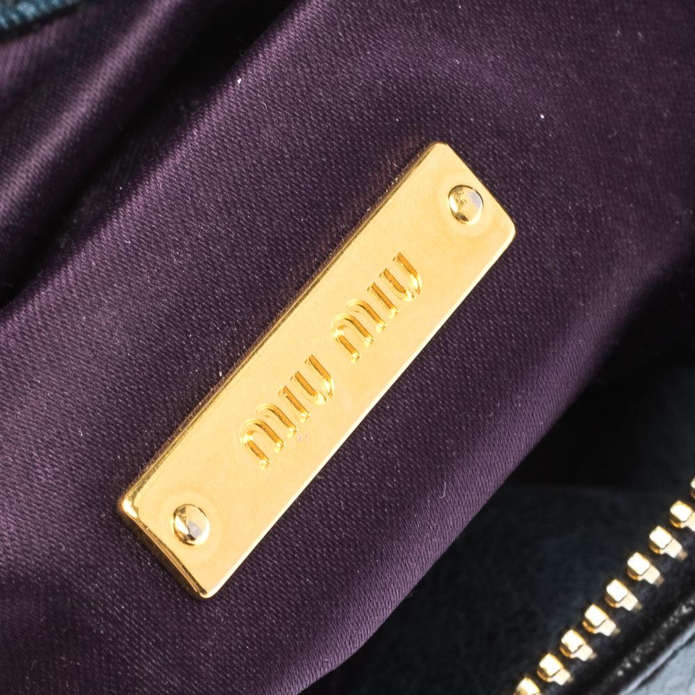 Miu Miu - Sac à dos en cuir bleu avec nœud 2