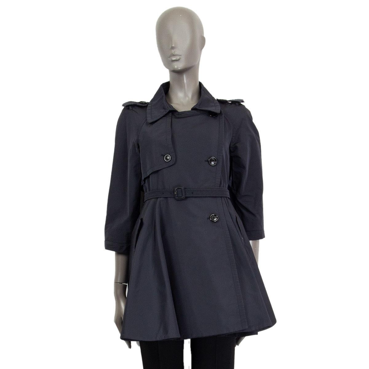 100% authentic Miu Miu double-breasted flared short trench coat in midnight blue polyester (53%) and acetate (47%). Features 3/4 sleeves, waist belt, a gun flap and epaulettes. Has been worn and is in excellent condition. 

Tag Size 42
Size