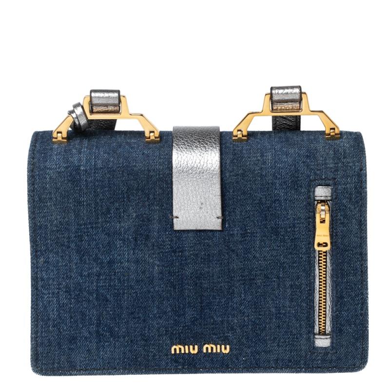 A designer crossbody bag to carry your essentials this season and the ones after. Designed by Miu Miu, this denim and leather bag features a suede-lined interior, an adjustable shoulder strap, and the brand signature at the back.

Includes: Info