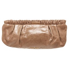 Miu Miu Brown Leather Clutch Bag with material leather gold-tone hardware