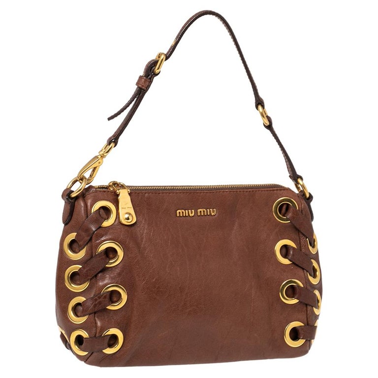 Miu Miu Brown Leather Eyelet Pochette Clutch For Sale at 1stDibs