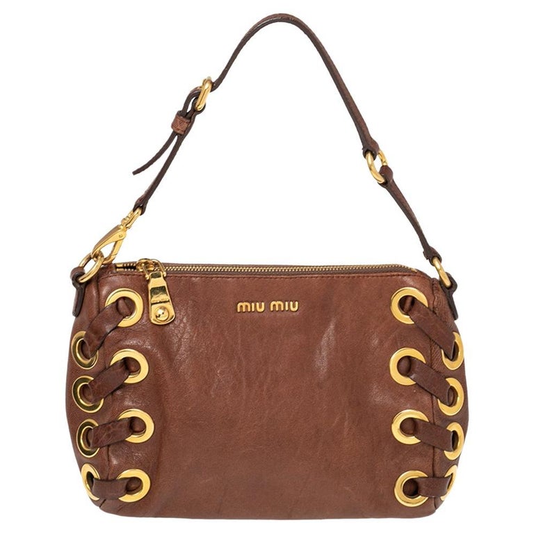 Miu Miu Brown Leather Eyelet Pochette Clutch For Sale at 1stDibs
