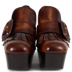 Chaussures miu miu en cuir marron, mocassins à franges et semelle compensée, pointure 36