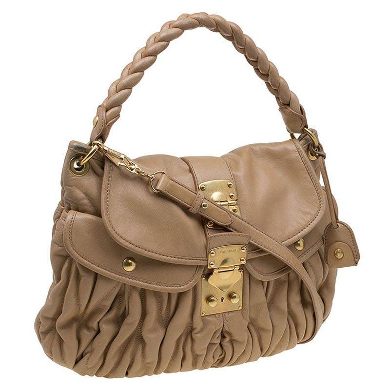 Miu Miu Brown Matelasse Leather Hobo In Good Condition In Dubai, Al Qouz 2