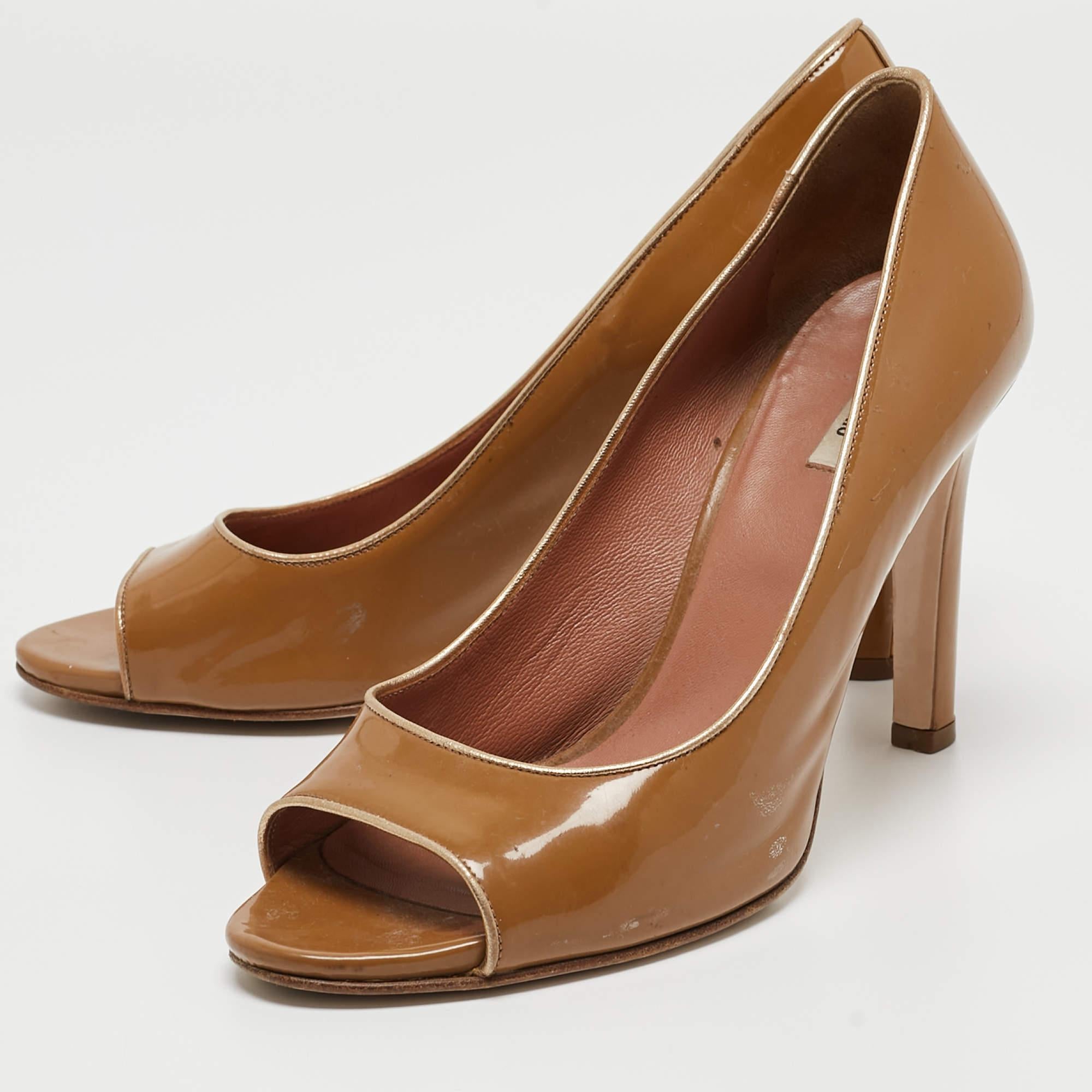 Eleganza e femminilità, queste décolleté Miu Miu hanno una silhouette chic e un design accattivante. Potete indossare queste décolleté per un look elegante.