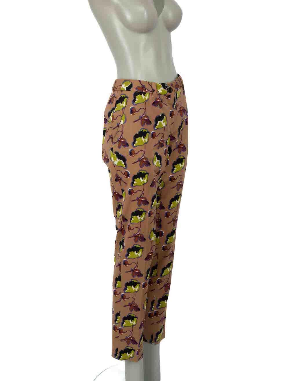 CONDITION is Never worn. No visible wear to trousers is evident on this new Miu Miu designer resale item.
 
Details
Brown
Wool
Trousers
Floral pattern
Slim fit
2x Side pockets
2x Back pockets
Fly zip and button fastening
Back buckle detail
 
Made in