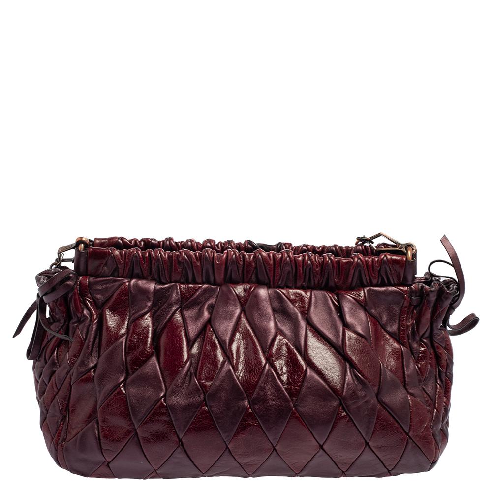 A bag that can assist you with many outings and can be styled with most of your attires. This Miu Miu bag is an example of the label’s penchant for creating staple pieces. It is crafted from leather in diamond-shaped quilts. The bag is finished off