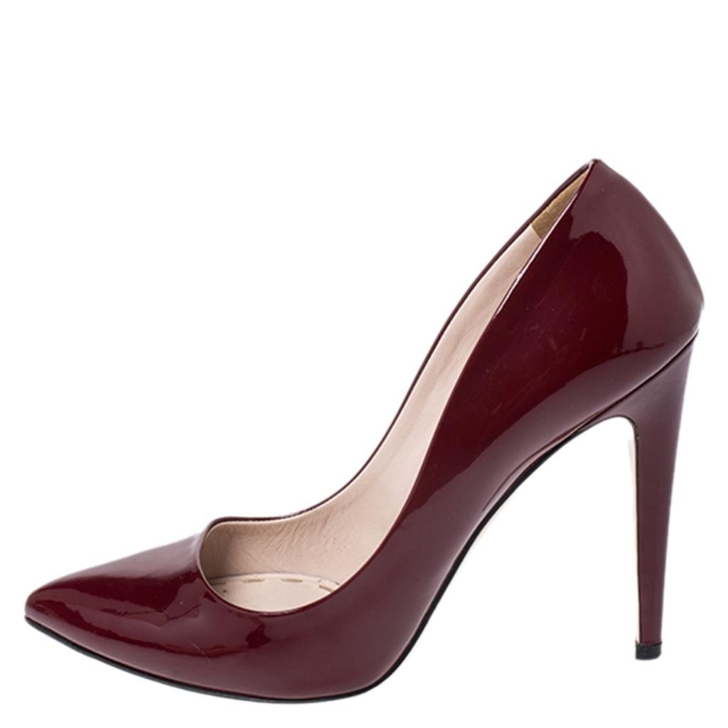 These gorgeous pumps by Miu Miu are crafted from patent leather and feature pointed toes. These pumps are lined with leather and elevated on 11.5 cm heels. They are sure to lend you style and confidence.

Includes: Original Dustbag

