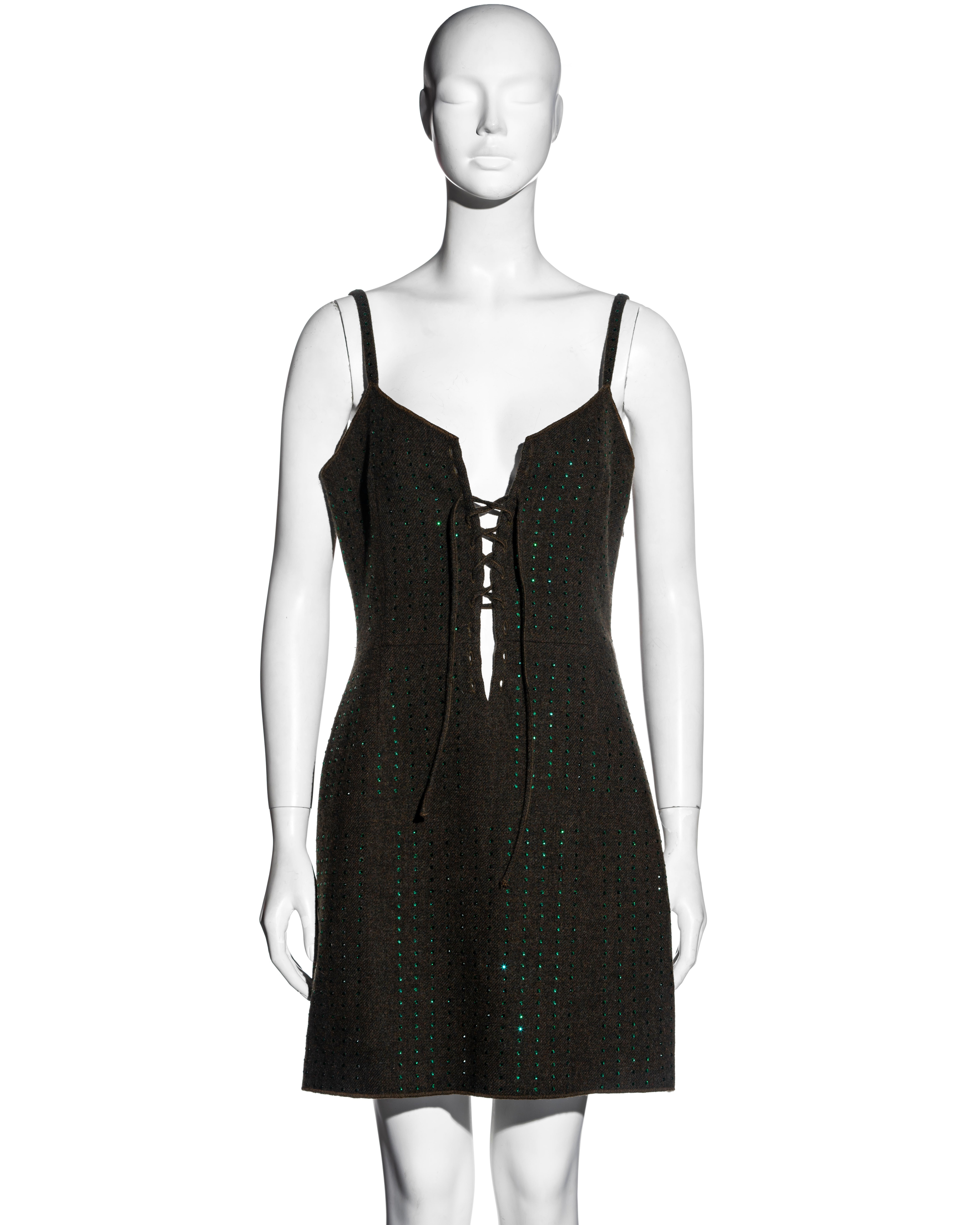 ▪ Miu Miu wool fleece slip dress
▪ Designed by Miuccia Prada 
▪ Allover flat-back crystals 
▪ Lace-up ties to the front opening 
▪ Loose fit 
▪ Fully lined 
▪ IT 42 - FR 38 - UK 10
▪ 100% Wool Fleece, Lining: 100% Acetate
▪ Spring-Summer 1998