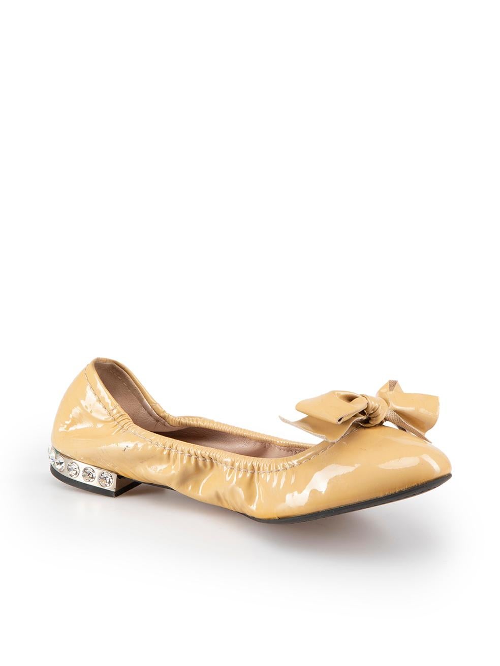 CONDITION is Good. General wear to flats is evident. Moderate signs of wear to overall shoes with discoloured marks to outer leather, creasing to inner sole and around toe creases and signs of wear to inner soles on this used Miu Miu designer resale