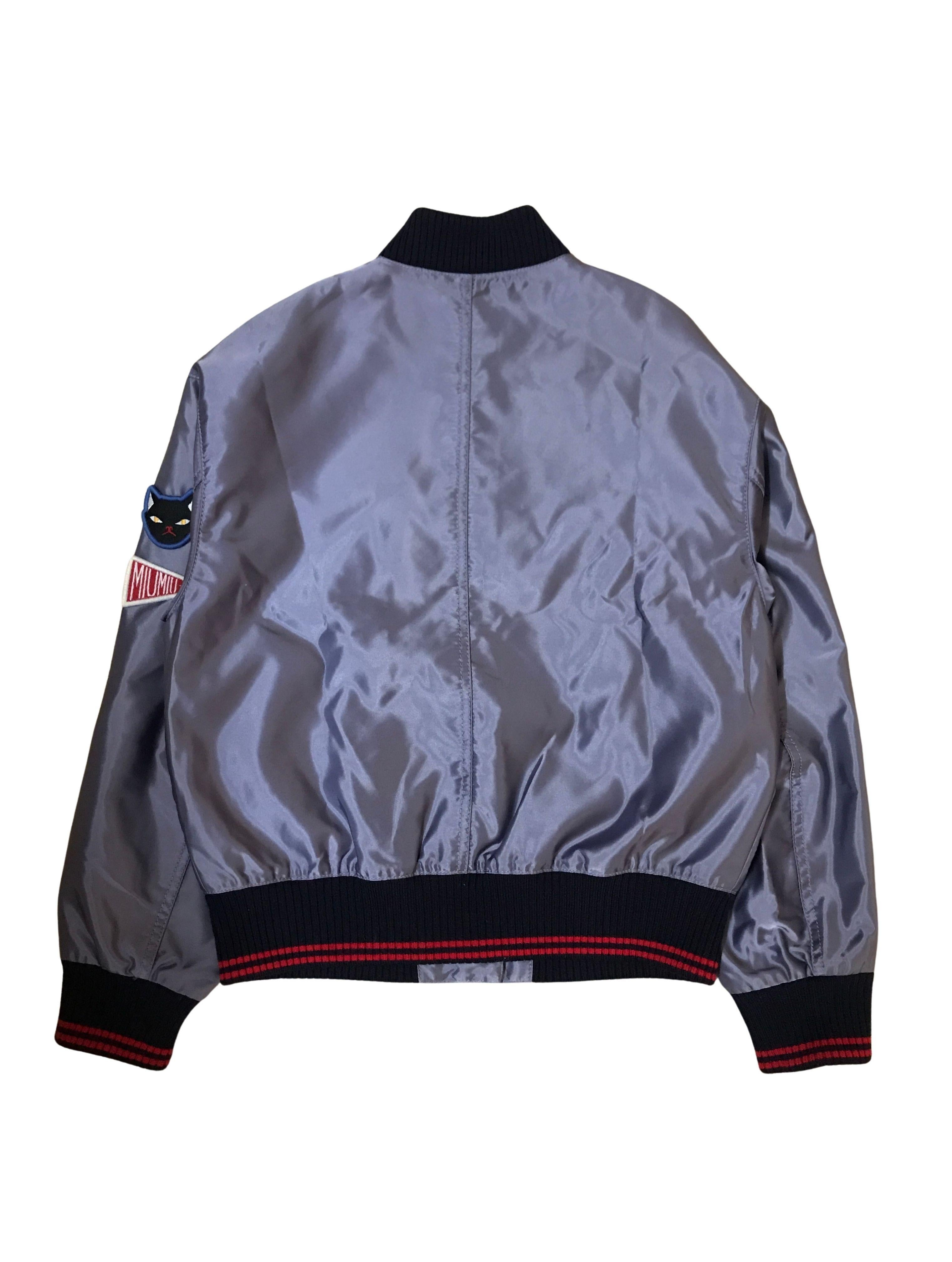 Miu Miu Appliqued bomber from 2018. Japan Exclusive colorway.

Condition: 9/10, no significant signs of usage.

Size: M, fits relaxed.