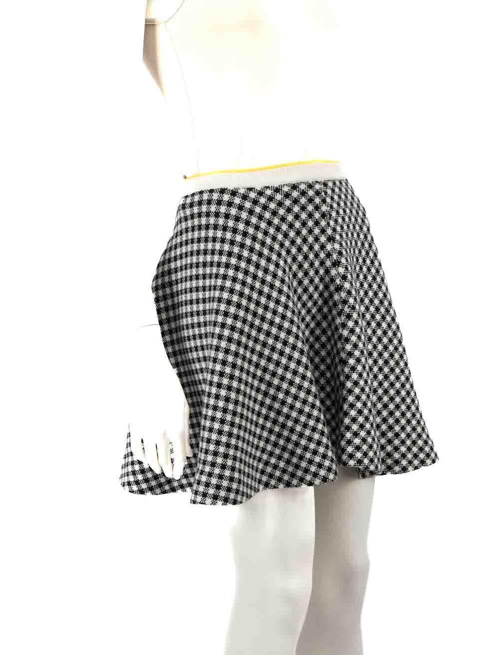 CONDITION is Very good. Minimal wear to skirt is evident. Minimal wear to front with a pluck to the weave as well as minor discolouration seen on this used Miu Miu designer resale item.
 
 
 
 Details
 
 
 Multicolour - black and white
 
 Cotton
 
