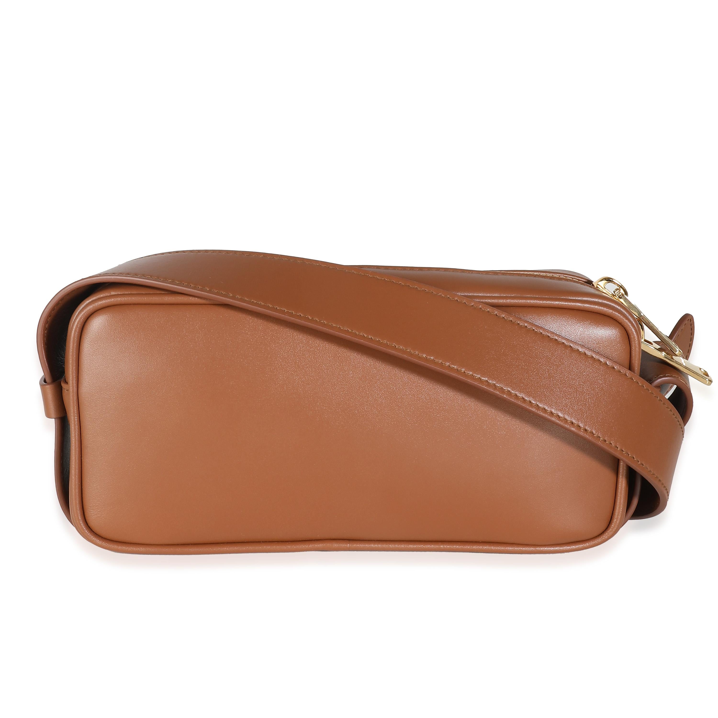 Listing Title: Miu Miu Cognac Calfskin Arcadie Bag
SKU: 140591
MSRP: 3050.00 USD
Condition: Pre-owned 
Handbag Condition: Pristine
Condition Comments: Item has no indication of wear.  Final sale.
Brand: Miu Miu
Model: Arcadie Bag
Origin Country: