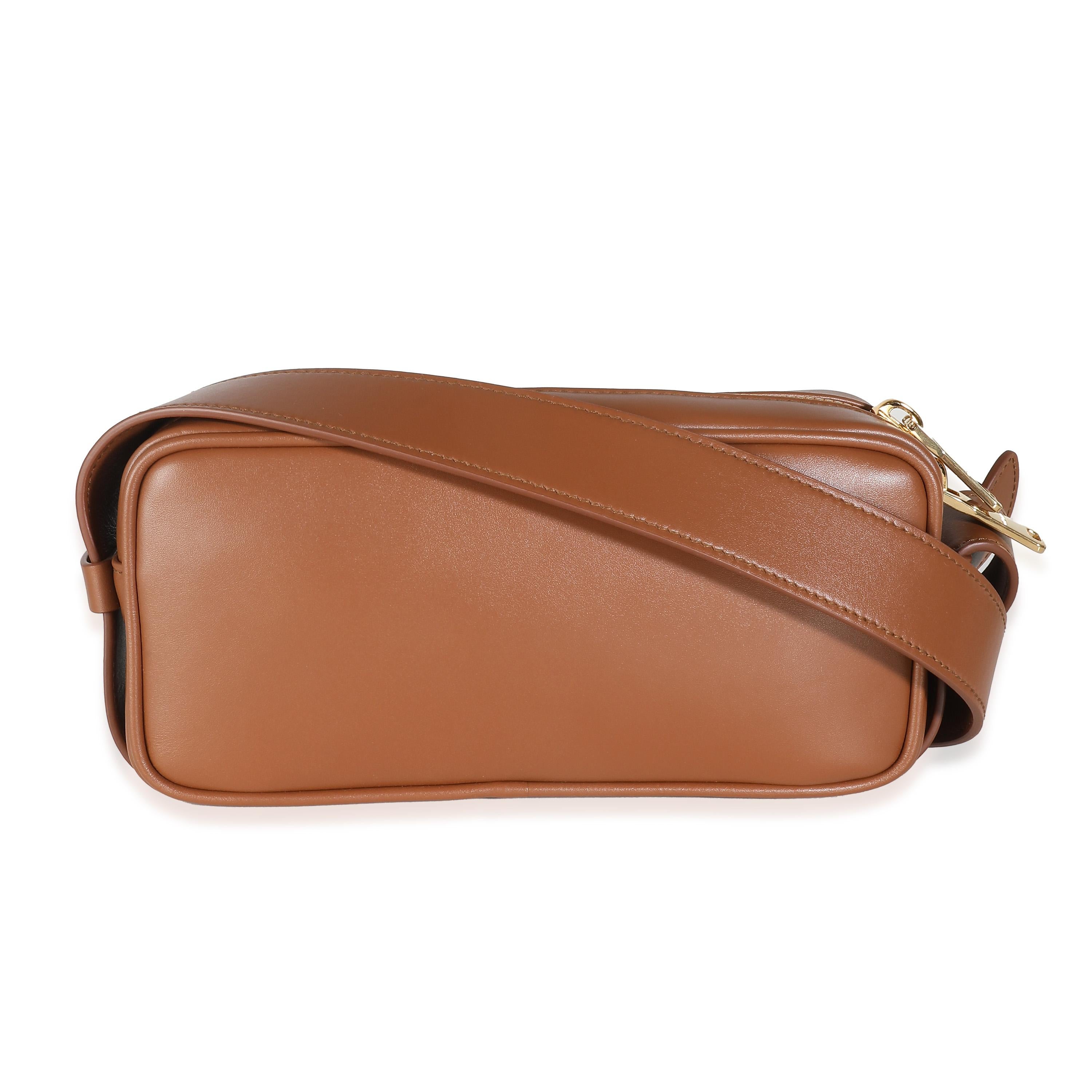 Listing Title: Miu Miu Cognac Calfskin Arcadie Bag
SKU: 140593
MSRP: 3050.00 USD
Condition: Pre-owned 
Handbag Condition: Pristine
Condition Comments: Item has no indication of wear.  Final sale.
Brand: Miu Miu
Model: Arcadie Bag
Origin Country: