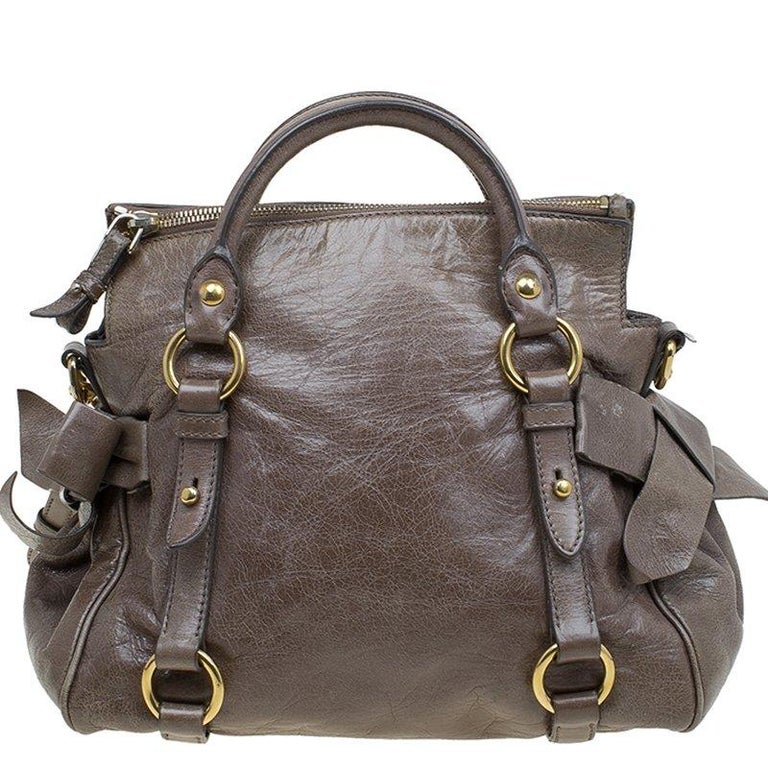 Miu Miu Dark Grey Vitello Lux Leather Bow Top Handle Bag For Sale at