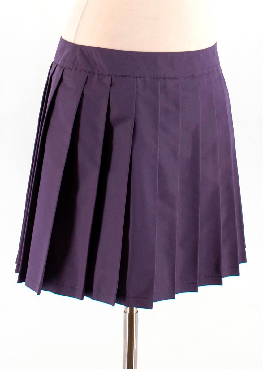 MIU MIU Dark Purple Silk Blend Pleated Skirt 

- Pleated Skirt 
- Invisible side Zip 
- Mini Skirt
- Tonal Stitching 

Materials 
56% Polyester 
44% Silk 

Made in Romania

Please note, these items are pre-owned and may show signs of being stored