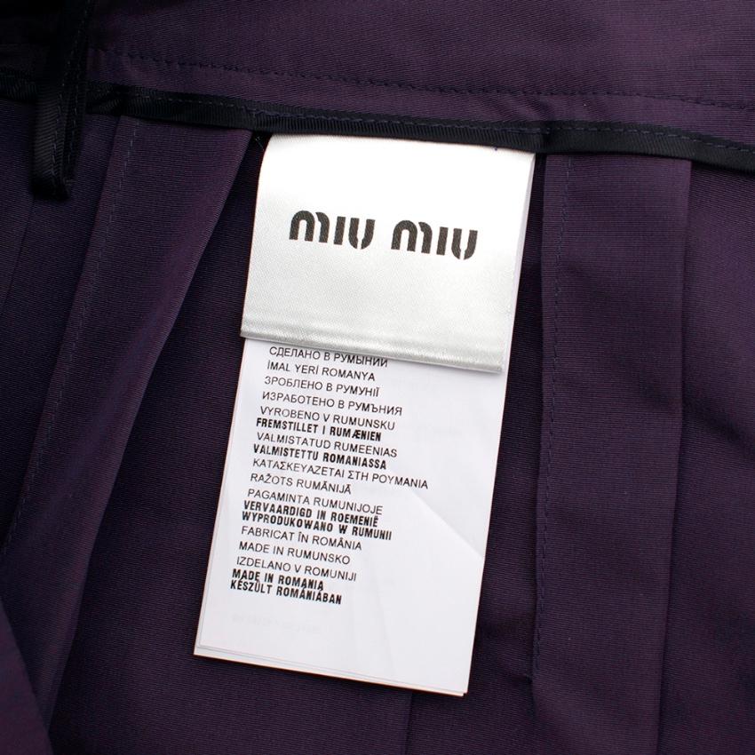 dark purple pleated skirt