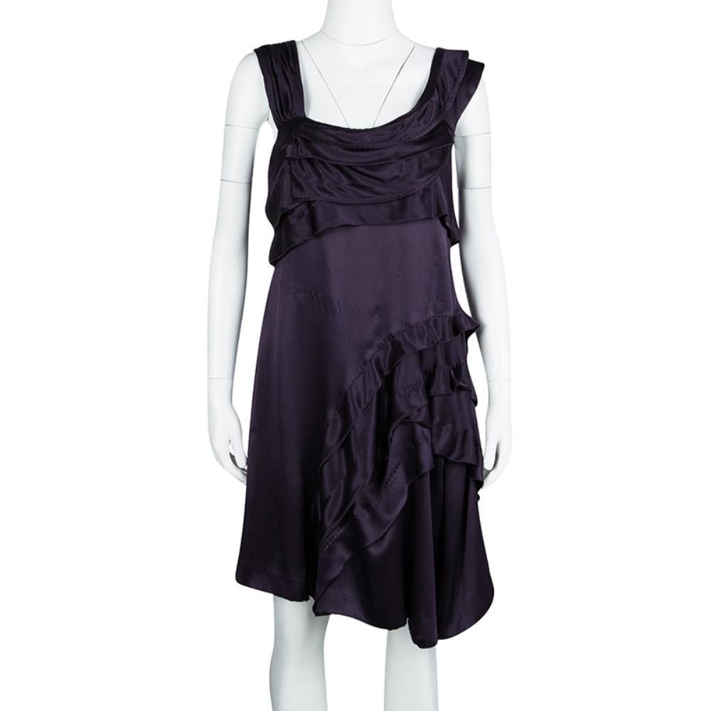 Ever seen a dress this gorgeous? Miu Miu brings you this silk dress that comes flaunting a deep purple hue along with a sleeveless style and ruffles. Team this closet darling with a pair of metallic sandals and voila, you're all set to look your