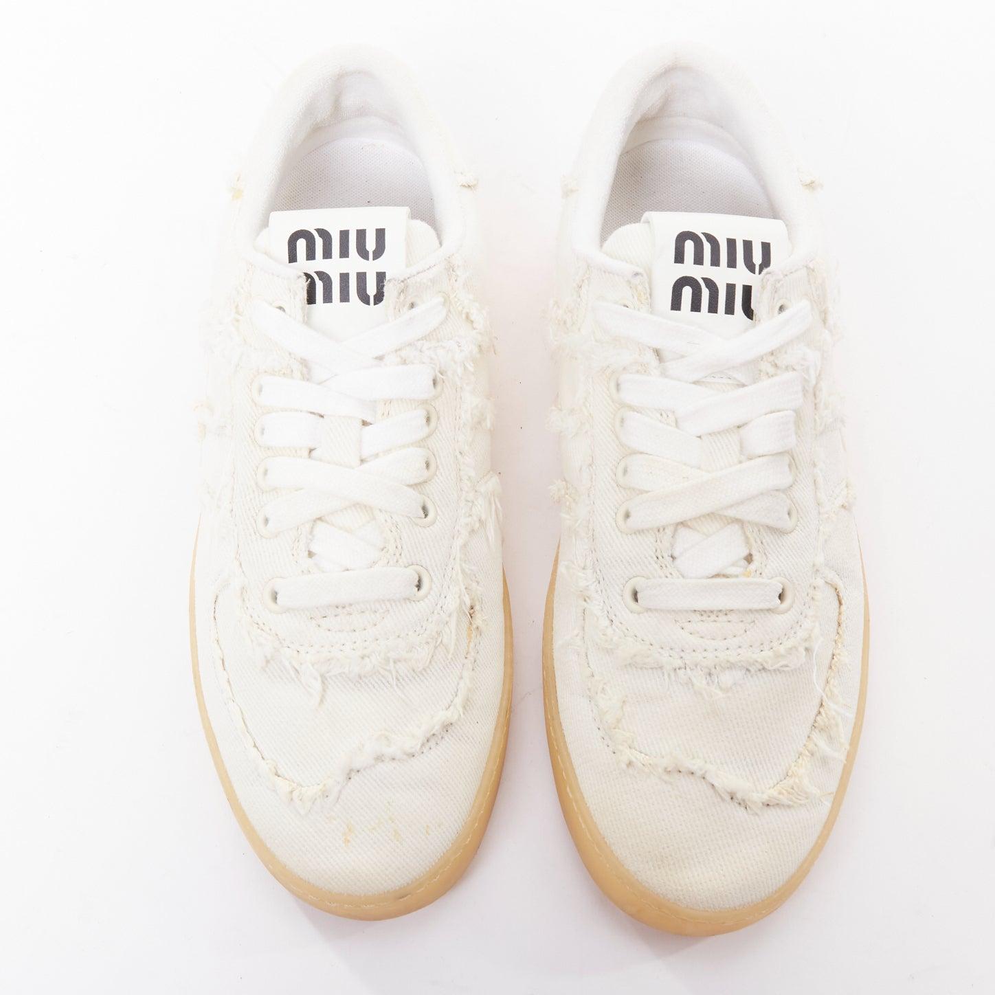 MIU MIU Denim beige crudo corte deshilachado lona zapatillas skate EU37
Referencia: KYCG/A00202
Marca: Miu Miu
Diseñador: Miuccia Prada
Model No: 5E325E_CSL_F0304_F_005
Colección: Demo,
Material: Denim
Color: crema
Patrón: Sólido
Cierre: