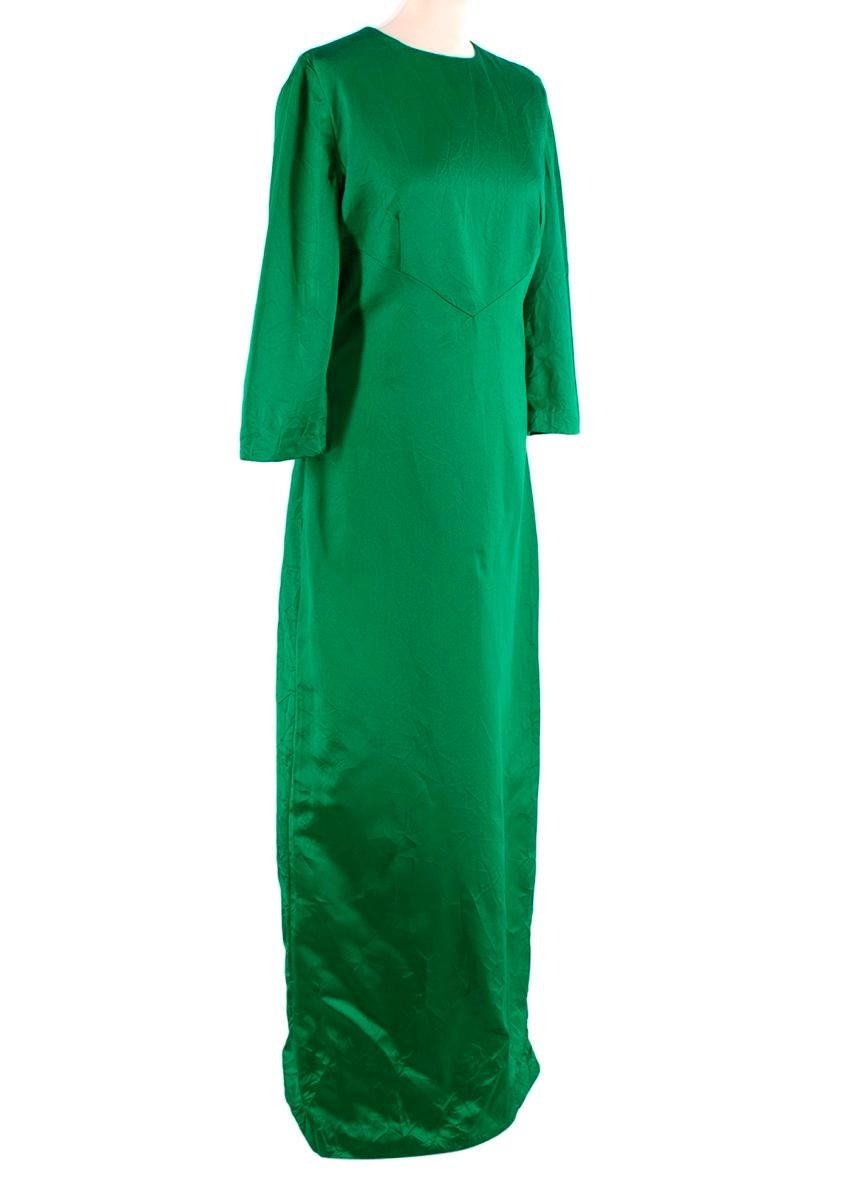 Miu Miu Duchesse Satin Froiss Green Silk Gown
 

 - Green silk satin gown with crinkled effect
 - 3/4 sleeve length 
 - Round neckline
 - Split to the back hem
 - Concealed back zip closure
 - Partially lined in teal fabric
 

 Materials:
 100%