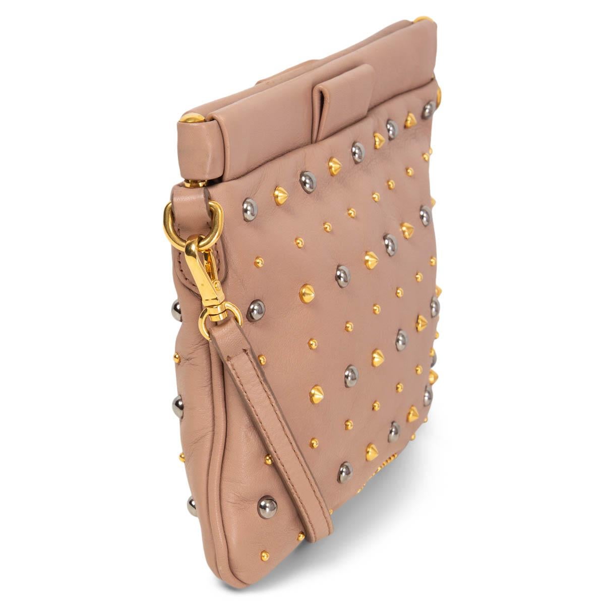 100% authentic Miu Miu Small Studded Crossbody Bag in dusty rose leather. Lined in grey satin with one patch pocket against the back. Has been carried and is in excellent condition. Comes with dust bag. 

Measurements
Height	14cm (5.5in)
Width	19cm