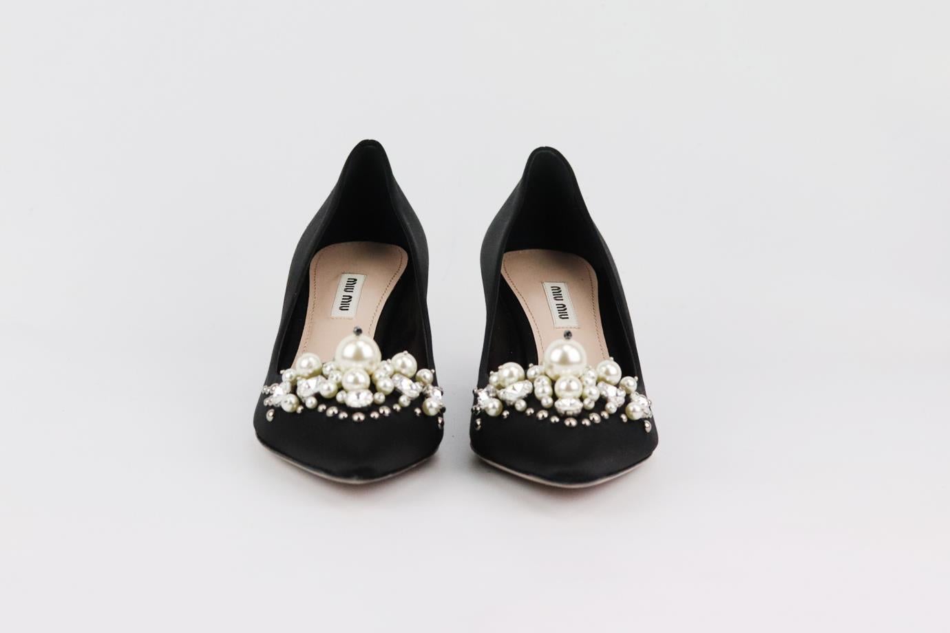 These pumps by Miu Miu are dotted with crystals and pearls along the sweetheart vamp, this point-toe pair has been made in Italy from lustrous black satin, they're set on sculptural 55mm heels. Heel measures approximately 55mm/ 2 inches. Black