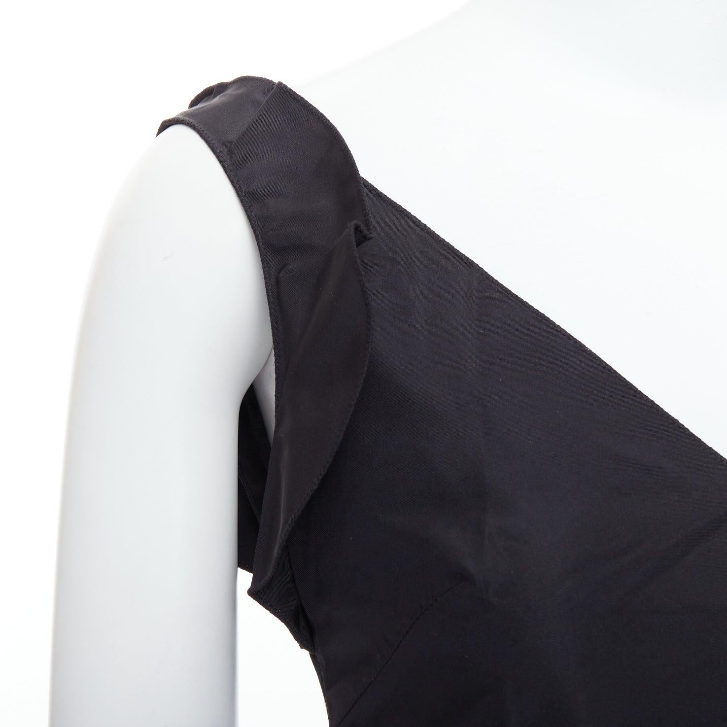 MIU MIU FW98 Vintage black silk blend ruffle strap V back dress IT38 XS
Reference: TGAS/E00249
Brand: Miu Miu
Designer: Miuccia Prada
Collection: 1990's
Material: Silk, Blend
Color: Black
Pattern: Solid
Closure: Zip
Lining: Black Fabric
Extra