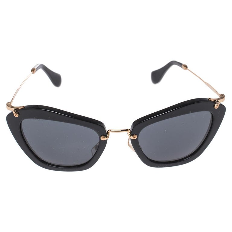 Miu Miu Gold/Black SMU 10N Cat Eye Sunglasses at 1stDibs
