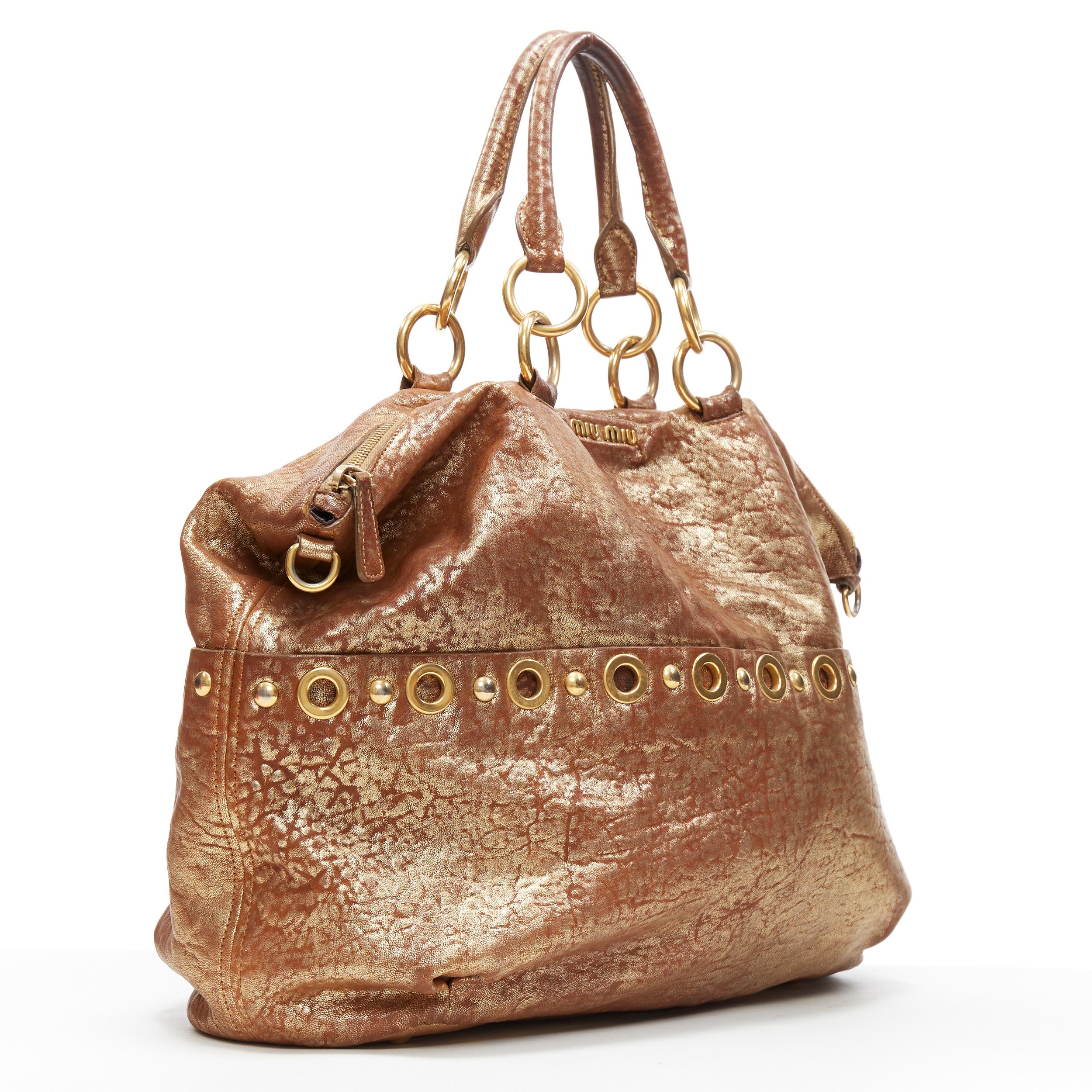 Brown MIU MIU gold coated pebble leather grommet studded top zip shoulder satchel bag
