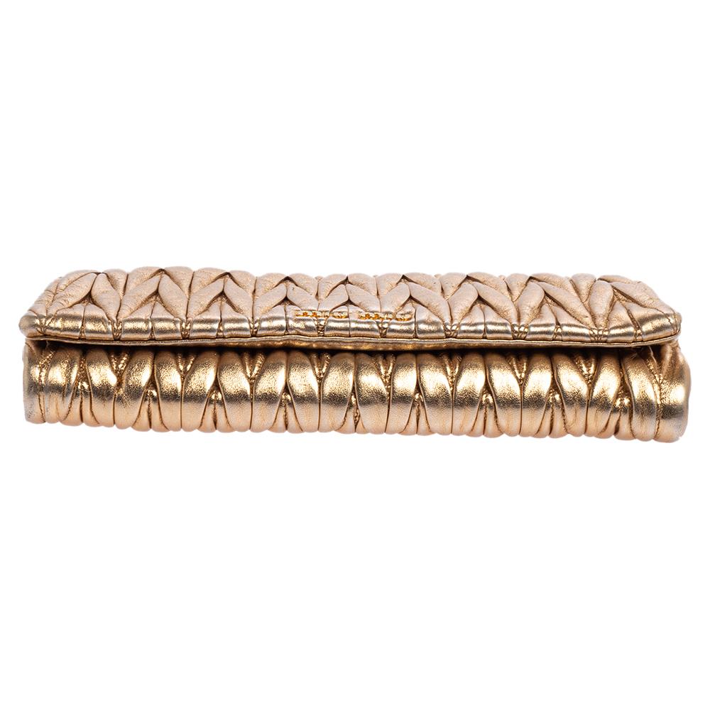 Miu Miu Gold Matelassé Leather Flap Clutch In Fair Condition In Dubai, Al Qouz 2