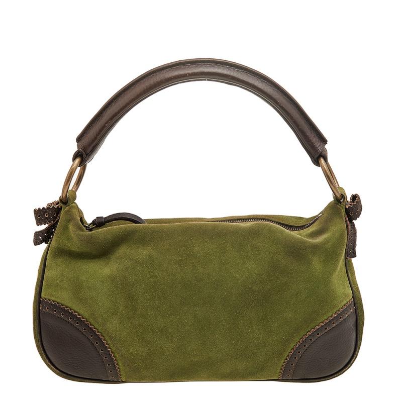  This Miu Miu hobo is masterfully crafted with the finest suede and leather, making it highly durable and practical. The bag flaunts a lovely green and dark brown exterior along with brass-tone hardware. The interior is fabric-lined and houses a zip