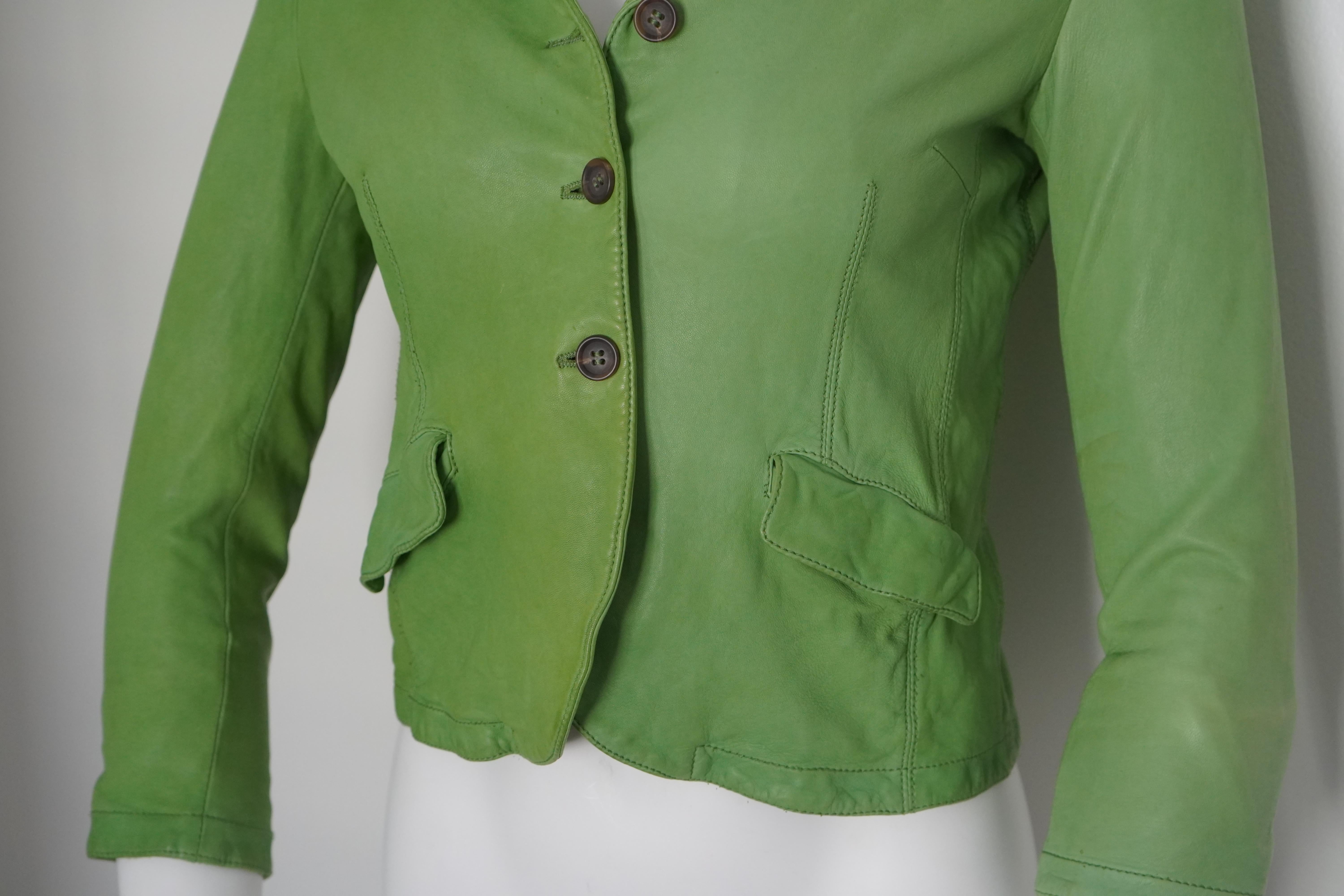 MIU MIU Green Leather Jacket
Made in Italy
Size S
3 button closure
Slightly cropped
Small hole on left arm (pictured) 