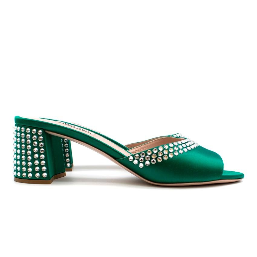 Miu Miu - Green Satin Slip on Mules 

- Crystal embellishment - Block heel - open toe 

Please note, these items are pre-owned and may show signs of being stored even when unworn and unused. This is reflected within the significantly reduced price.