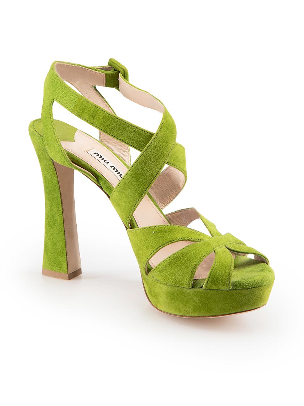 CONDITION is Very good. Minimal wear to heels is evident. Minimal wear to suede surface with some very light discolouration and abrasion to the pile found throughout on this used Miu Miu designer resale item.

Details
Green
Suede
Strappy