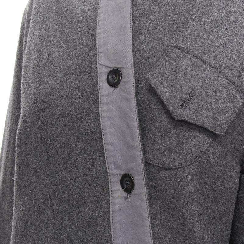 MIU MIU cappotto boxy asimmetrico con bottoni in misto lana e cashmere grigio IT38 XS
Riferimento: CELG/A00157
Marchio: Miu Miu
Stilista: Miuccia Prada
Materiale: Lana, misto
Colore: Grigio
Modello: Tinta unita
Chiusura: bottone
Dettagli extra: