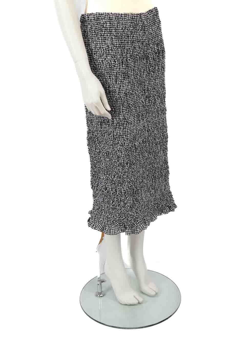 CONDITION is Never worn, with tags. No visible wear to skirt is evident on this new Miu Miu designer resale item.
 
 Details
 Grey
 Cotton
 Straight skirt
 Gingham pattern
 Smocked
 Stretchy
 Midi
 
 
 Made in Italy
 
 Composition
 98% Cotton, 1%