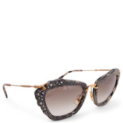 MIU MIU grey GLITTER CAT-EYE Lenses SMU04Q
