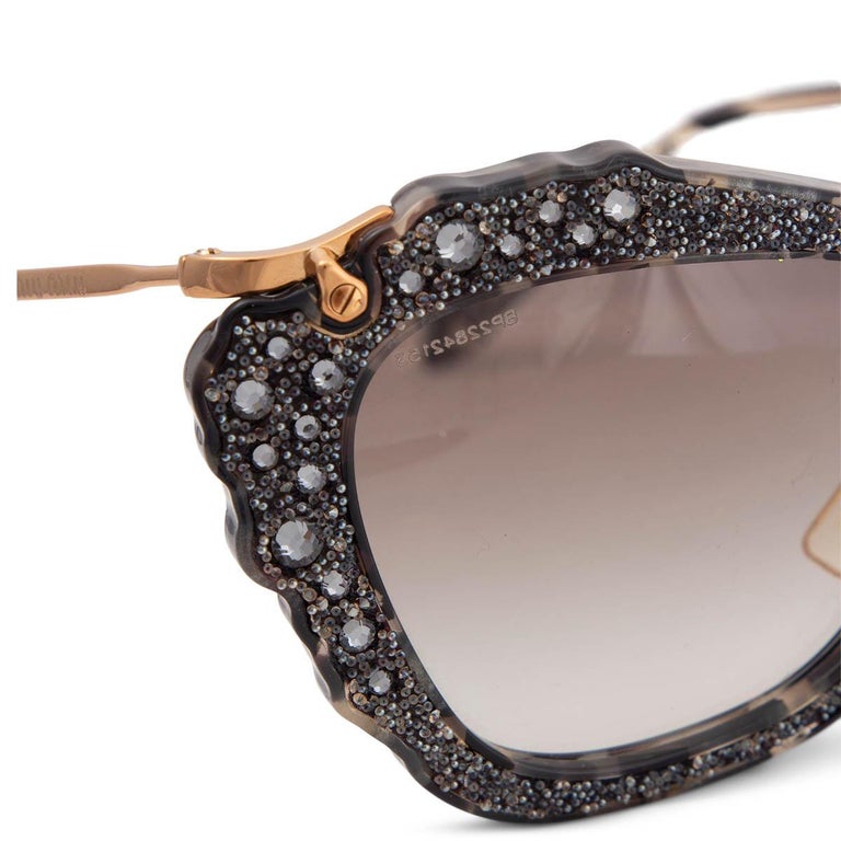 MIU MIU grey GLITTER CAT-EYE Lenses SMU04Q at 1stDibs | miu 