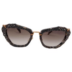MIU MIU grey GLITTER CAT-EYE Lenses SMU04Q