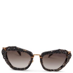 Miu Miu Women's Black Oversized Circular Sunglasses For Sale at 1stDibs