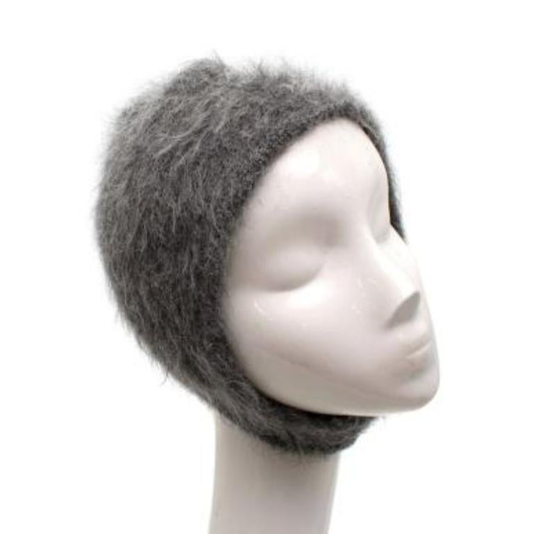Miu Miu Grey Mohair Knit Hood Hat

- Fuzzy grey mohair blend knit balaclava style hat/hood
- Chin strap and hole for the face
- Stretch medium weight knit fabric 

Made in Italy 
67% mohair 28% polyamide, 5% wool
Dry clean only

PLEASE NOTE, THESE