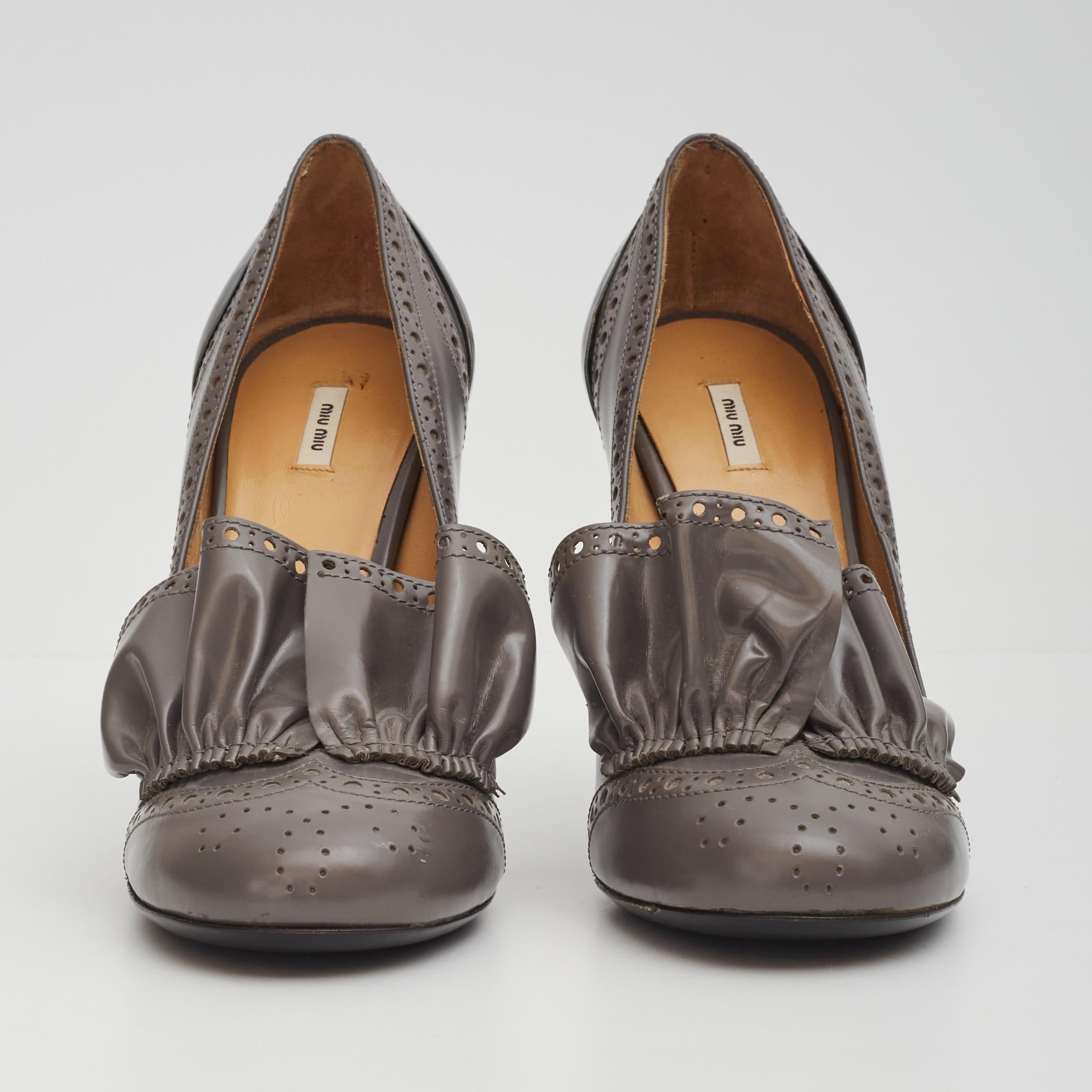 Color: Grey
Material: Leather
Size: 37 EU / 6 US
Heel Height: 100 mm / 4”
Condition: Very good. Light marks and scuffs to outsoles. Minimal signs of use to leather uppers.
Comes With: Dust Bag And Box 

Made in Italy