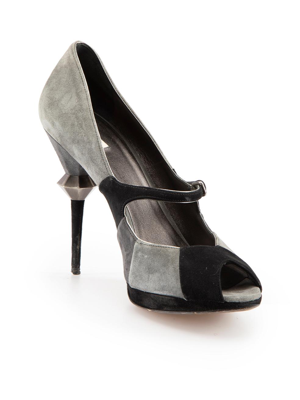 CONDITION is Good. Minor wear to shoes is evident. Light wear to both sides and heels of both shoes with abrasions, marks and indents to the leather on this used Miu Miu designer resale item.
 
Details
Grey
Suede
Heels
Black suede panels and