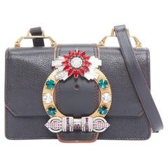 MIU MIU Lady black leather colorful rhinestone buckle flap crossbody bag