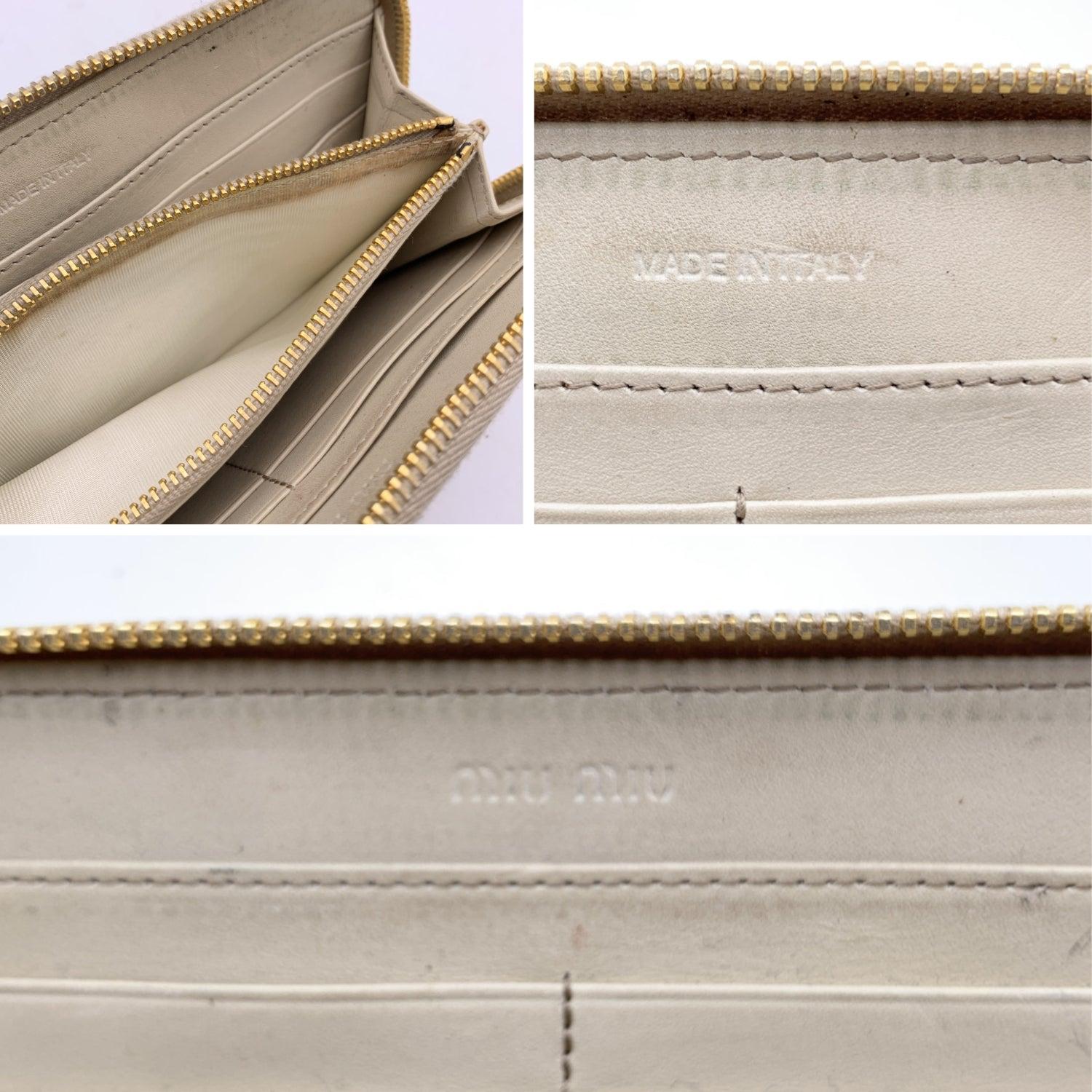Women's Miu Miu Light Beige Embossed Leather Zippy Long Continental Wallet For Sale