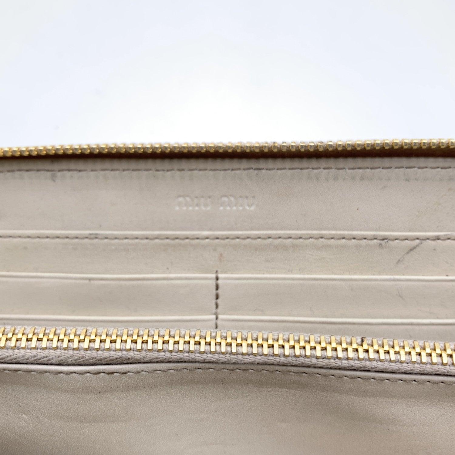 Miu Miu Light Beige Embossed Leather Zippy Long Continental Wallet For Sale 4
