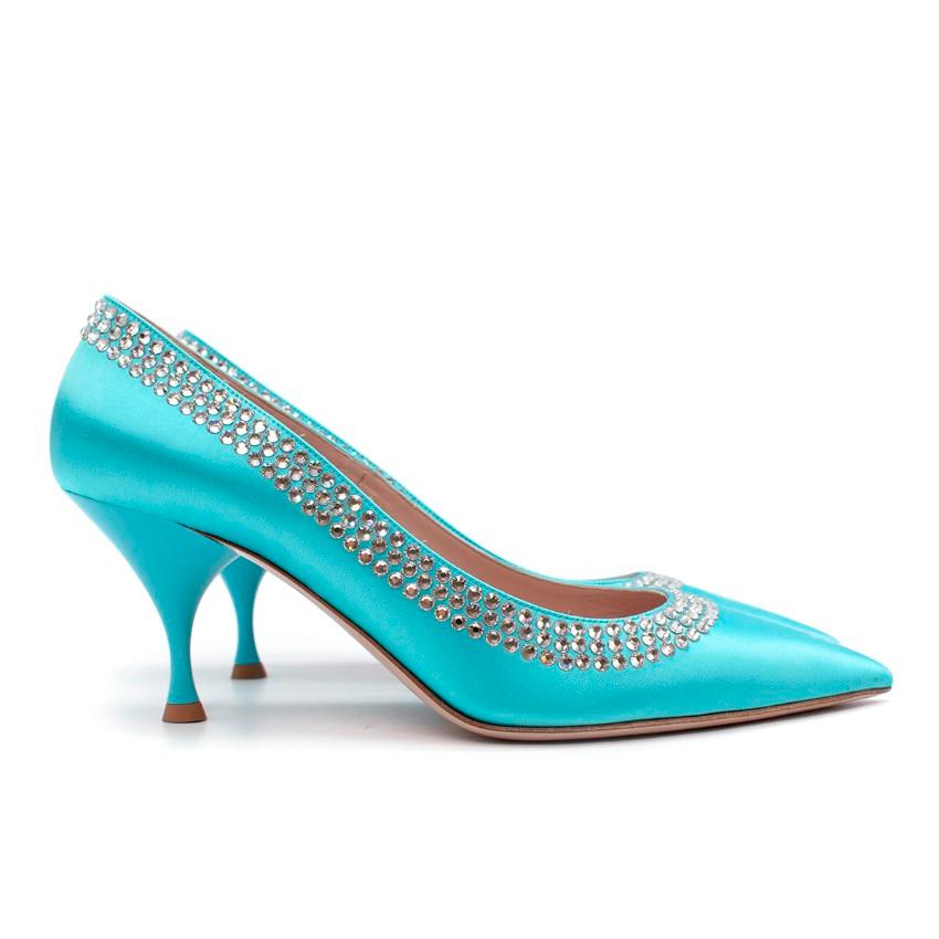  Miu Miu Light Blue Satin Crystal Trim Pointed Pumps

- AW 2019 Runway Collection
- The lustrous satin upper is embellished with rows of crystals along the edge
- Shaped to a pointed toe
- Set on a slender heel

Materials:
Satin
Leather

Made in