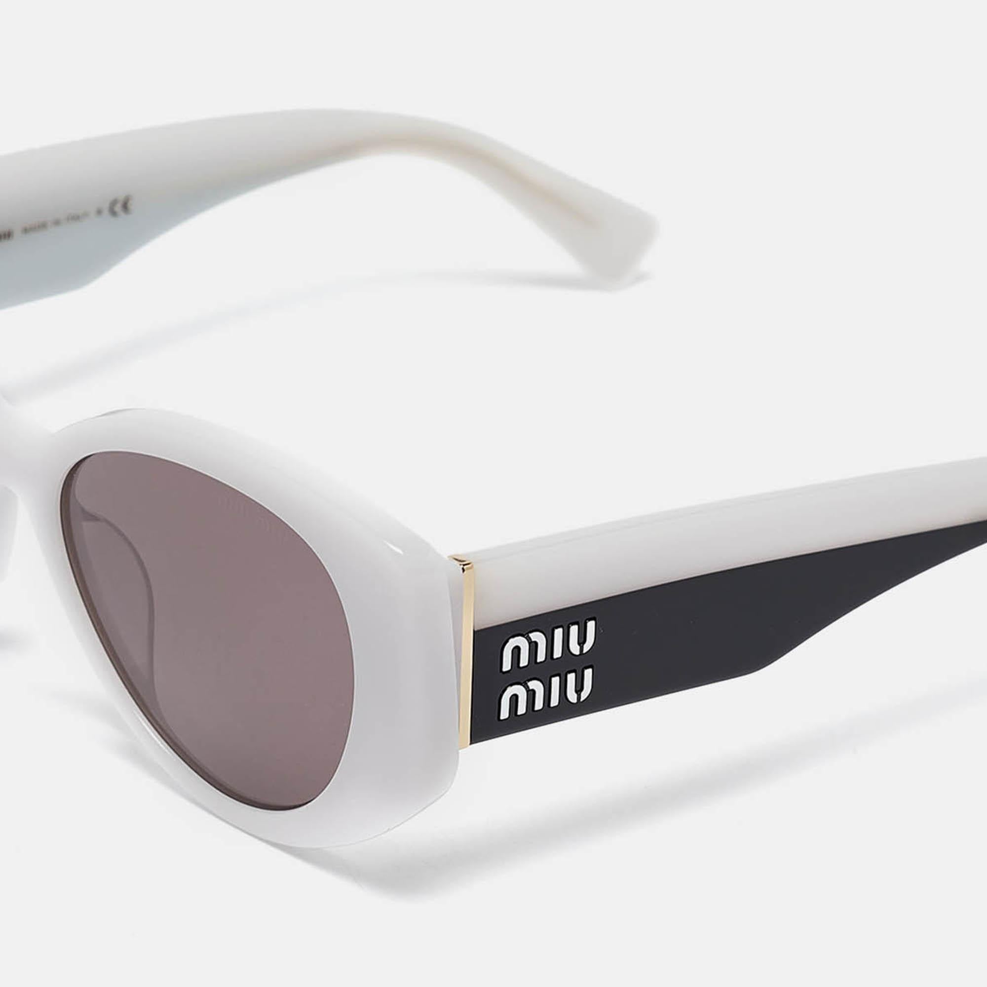 A fashionable accessory  this pair of Miu Miu sunglasses will make you look chic. It is created from acetate and its slender temples is detailed with brand signature for a recognizable touch.