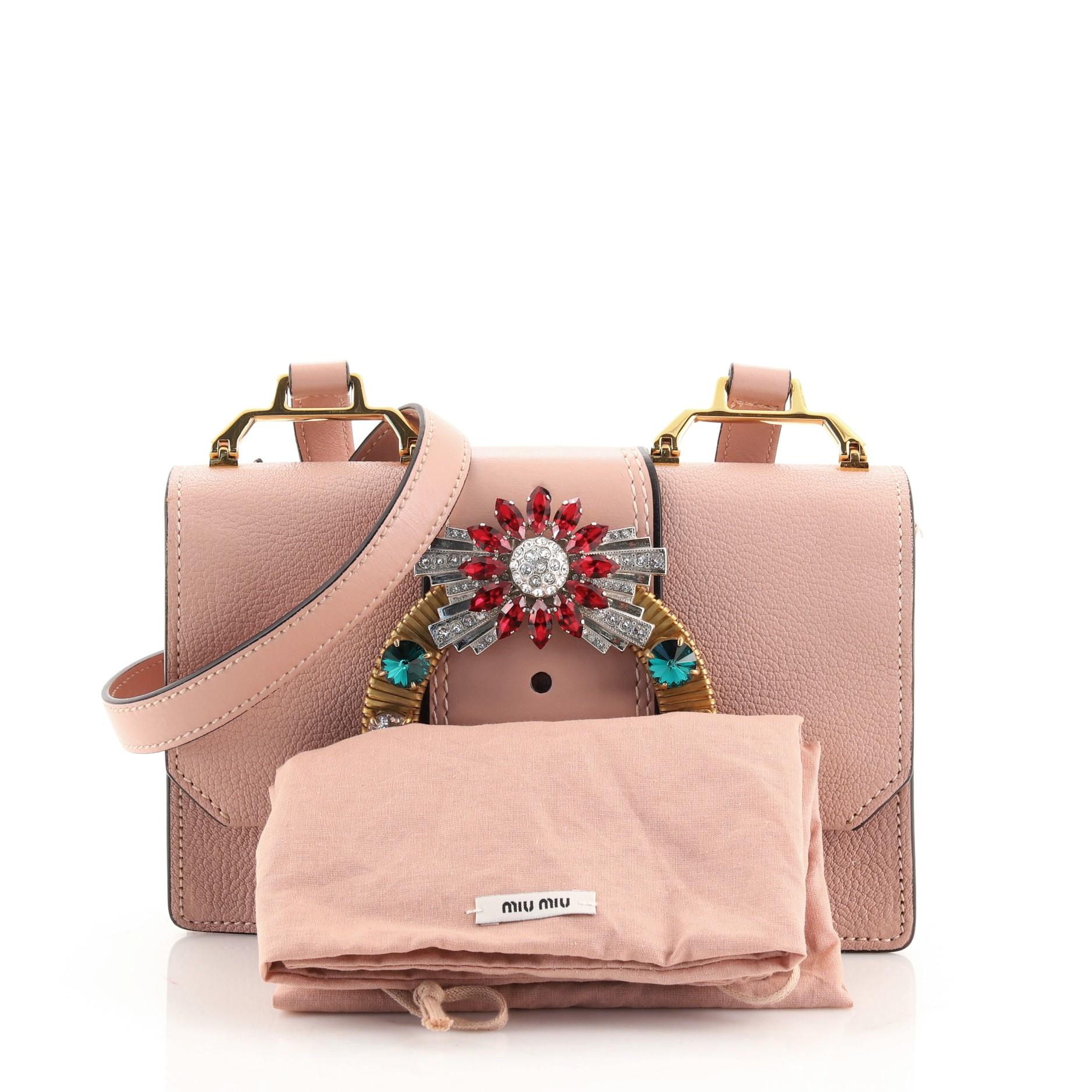 Condition: Good. Odor in interior. Loss of shape on base and side, creasing and light wear on exterior and strap, loose stitch on front opening corner. Cracking on strap base, side flap and opening wax edges, wear and small marks underneath flap and